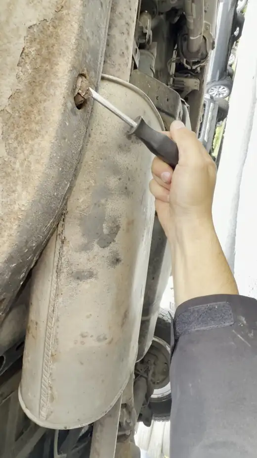 Probing inside the rear chassis rail, 2014 Nissan Navara