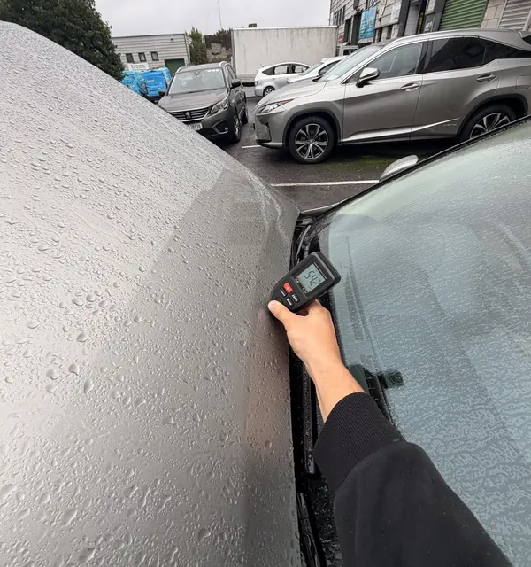 Measuring the bonnet, where filler showed the front-end repair., 2014 Lexus IS 300h